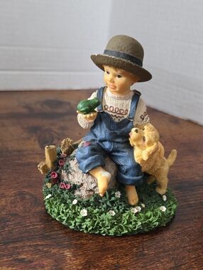 vintage Avon resin collectible figurine featuring a country boy in denim overall